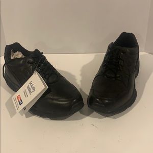 Woman’s black sneakers